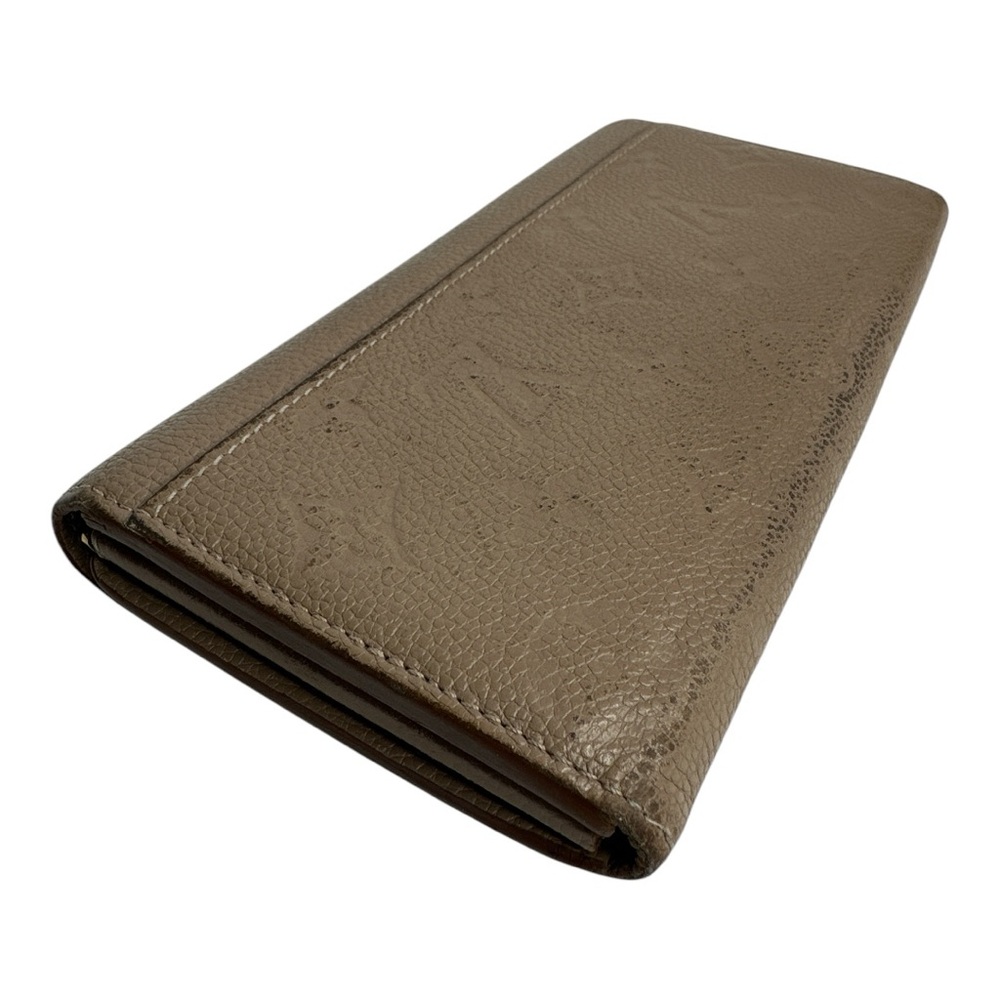 Louis Vuitton Monogram Empreinte Leather Sarah Wallet in Neutral - Picture 2 of 15
